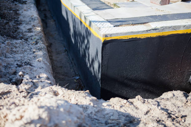 Professional Basement Waterproofing technician working in Verbena, AL